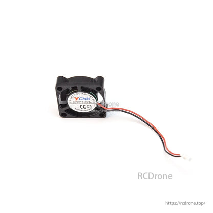 Close-up of cooling fan rear sticker with model information, plus red/black wire lead and 2-pin plug