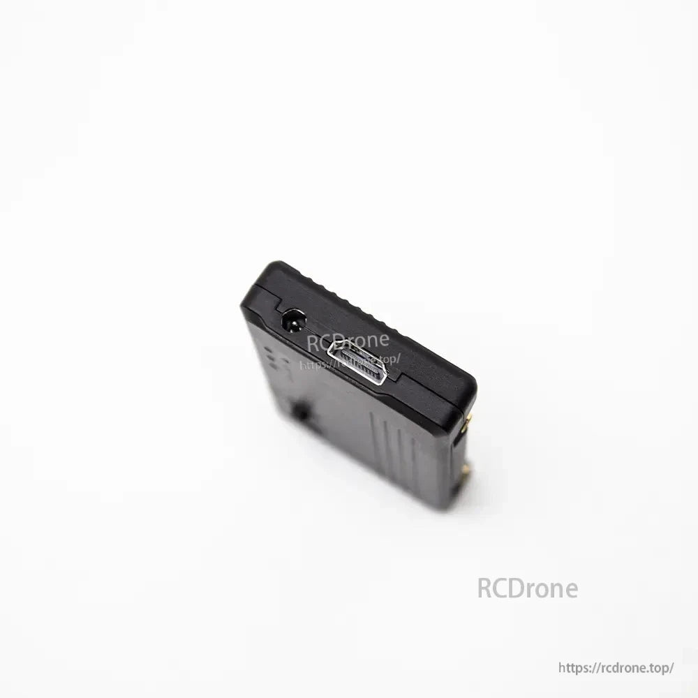 Angled close-up of HDMI out and adjacent side connector on the VRX