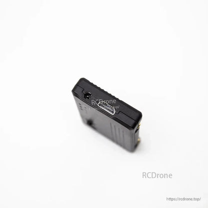 Angled close-up of HDMI out and adjacent side connector on the VRX