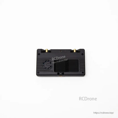 Back panel view with cooling fan grille and heatsink vent fins