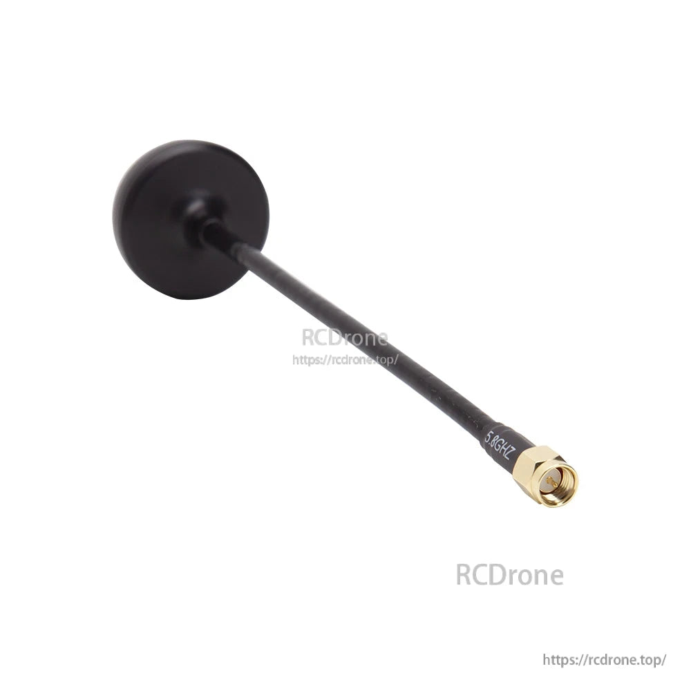 Black 5.8GHz mushroom antenna close-up with coax lead and gold connector end