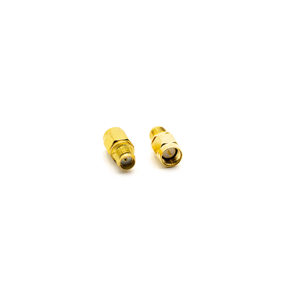 SMA/RP-SMA adapter pair, straight gold coax connector with male and female threaded ends