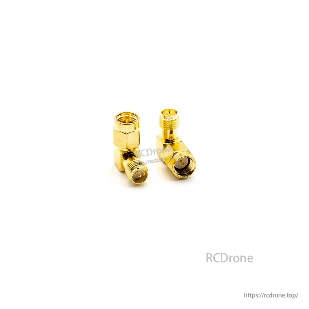 Right-angle coax connector adapters, close-up with hex nut body and threaded coupling sections