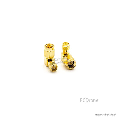 Right-angle coax connector adapters, close-up with hex nut body and threaded coupling sections