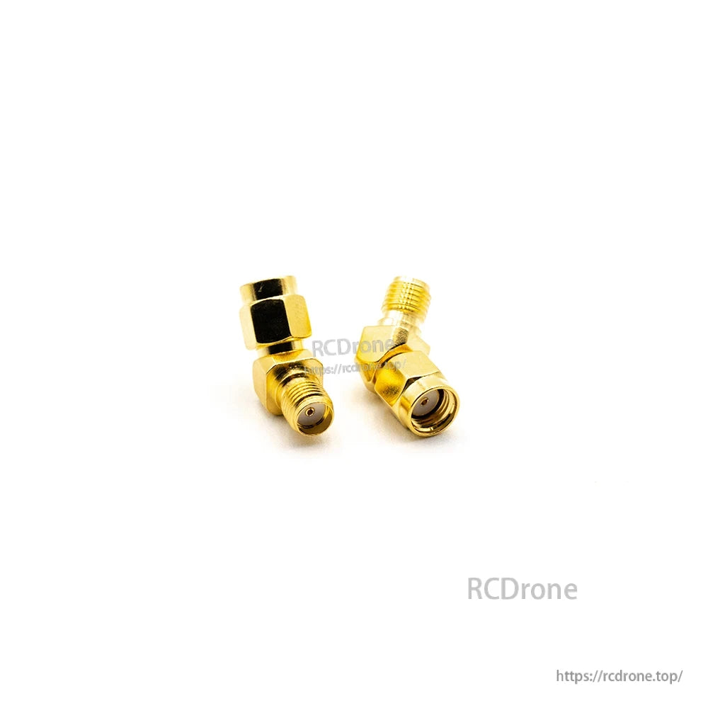 Right-angle SMA/RP-SMA adapter close-up showing elbow joint and threaded connector openings