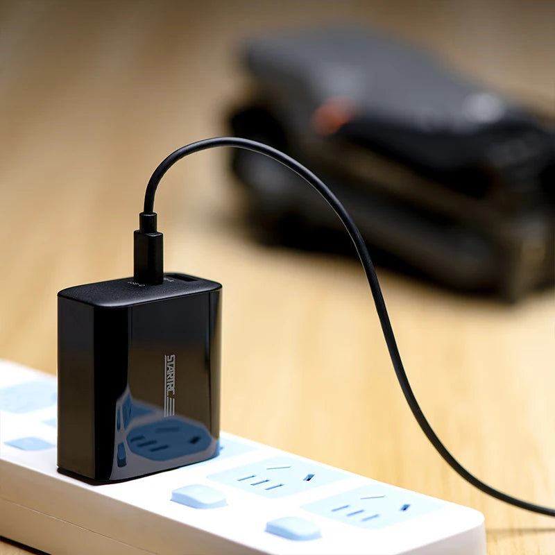 STARTRC 65W Charger, The Mini 4 Pro battery lasts around 70 minutes with a PD cable, or about 101 minutes when used without a cable.