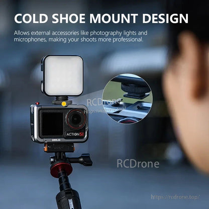 Cold shoe mount design for external accessories like lights and microphones, enhancing professional shoots.