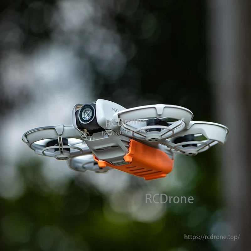 STARTRC Neo Battery Case, Made of 5g plastic, it supports stable landings and everyday battery protection, available in Grey and Orange.