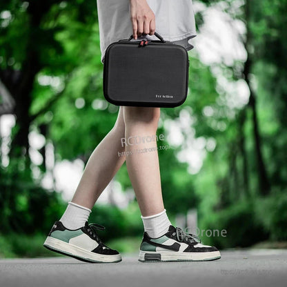 Hard carrying case with shoulder strap for DJI Action 5 Pro, by STARTRC PU Storage Bag. Protects and stores your device securely.