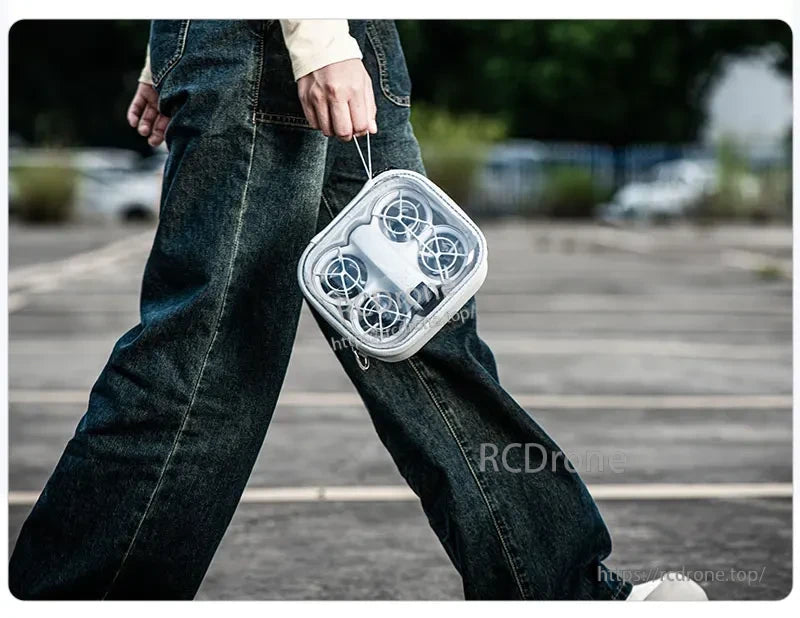 STARTRC Portable Storage Bag, This handbag secures DJI Neo and its essentials with a shock-absorbing interior and transparent top for easy content checking.