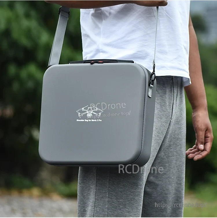 STARTRC Travel Handbag, The exterior features high-grade PU leather with a gray finish, bidirectional zippers, and an adjustable nylon shoulder strap.