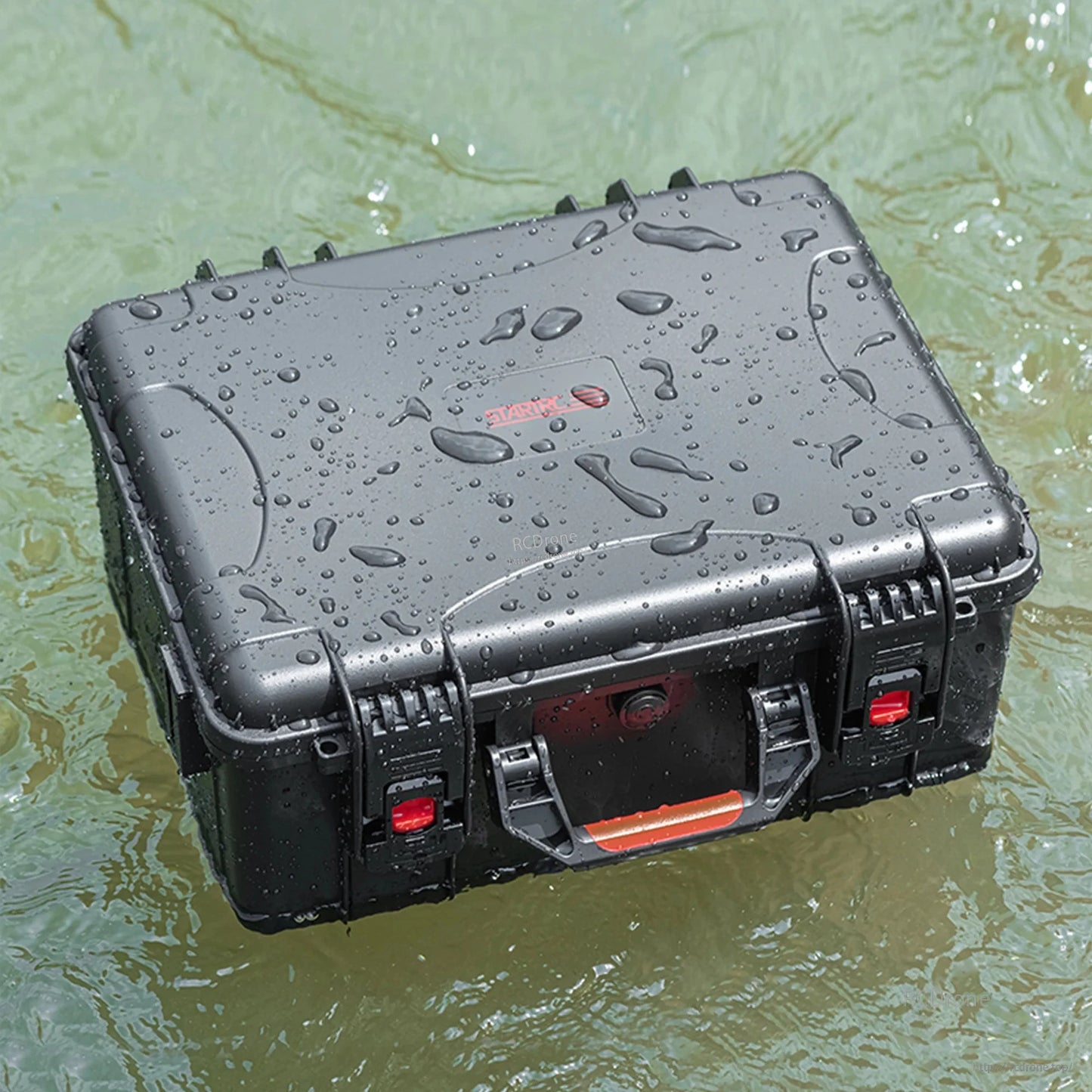 STARTRC Waterproof Hard Case closed with water droplets while floating in shallow water