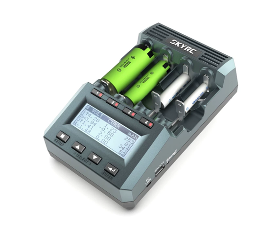 SkyRC MC3000 universal battery charger with four charging bays, LCD screen, and control buttons