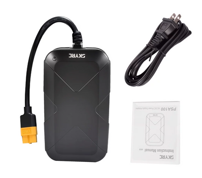 SkyRC PSA100 AC power supply adapter with attached cable and yellow XT60-style connector, plus US power cord