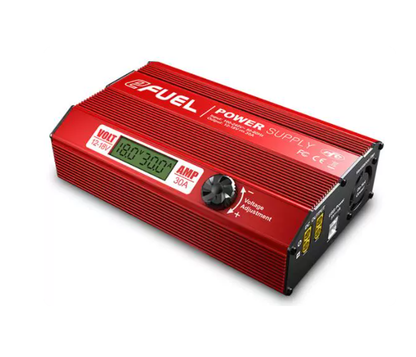 Angled view of SkyRC eFUEL power supply showing LCD voltage/current display and voltage adjustment dial