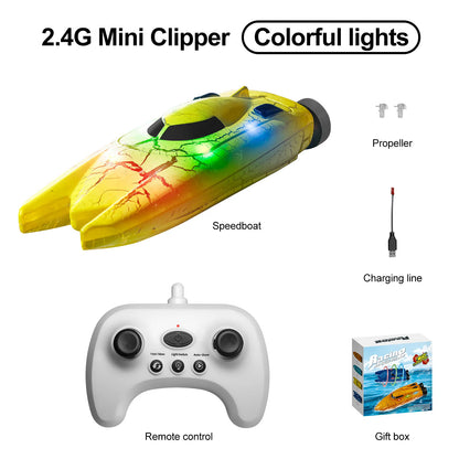 Mini Remote Controlled Boat, A 2.4G mini clipper featuring colorful lights, remote control, propeller, charging cable, and gift box—compact, fun, and ready-to-gift drone.