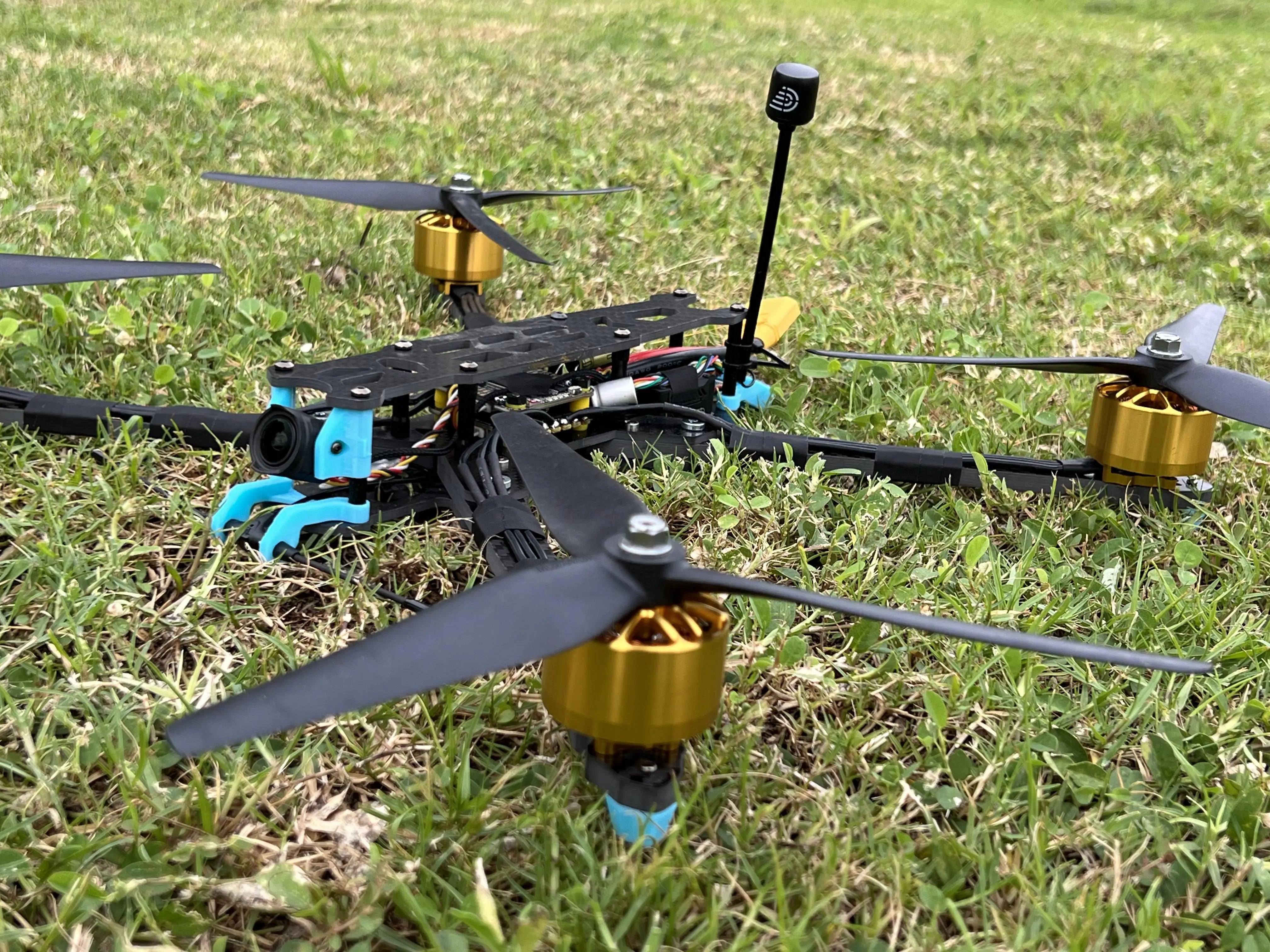 RCDrone Dolphin 10 Inch FPV Drone specifications: non-electric, plastic material, recommended for 14+ years old, used for vehicles and remote control toys.