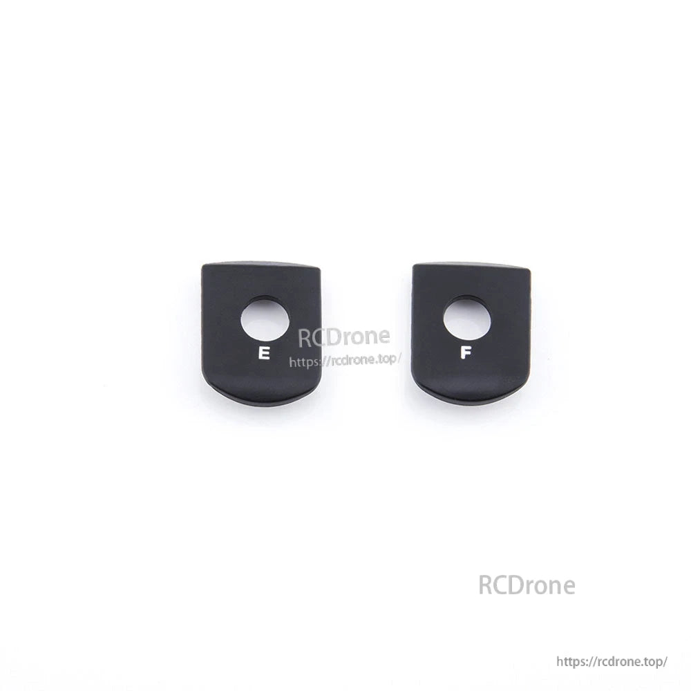 Shoulder Clip set with two black plastic pieces labeled E and F, top view on white background