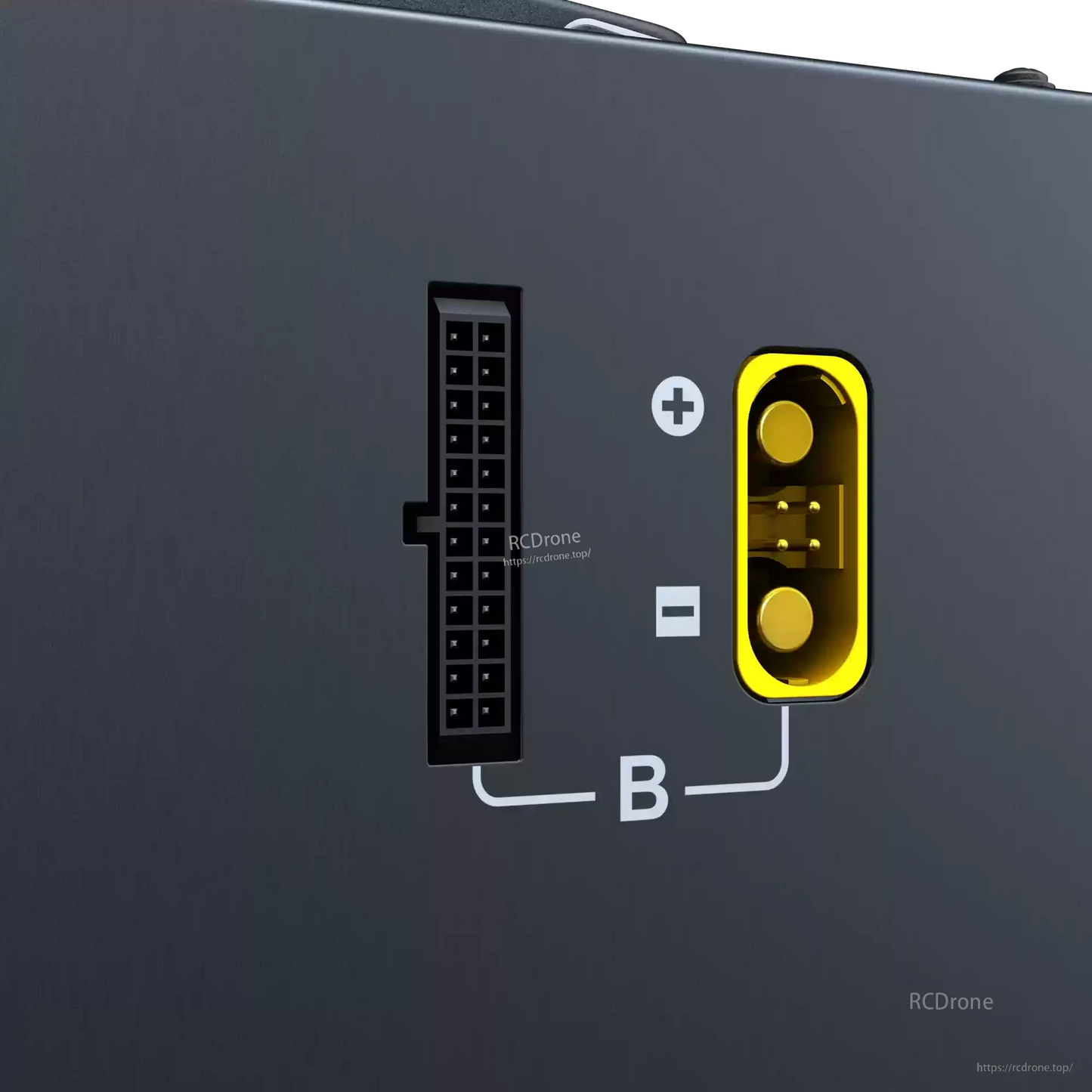 Close-up of SkyRC PC3020 charger output connectors with +/– marked yellow power terminal and multi-pin port