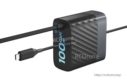 SkyRC PDC100 Fast Charger, SkyRC PDC100 100W charger block with attached USB-C cable and textured black housing