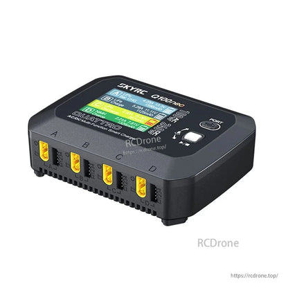 SkyRC Q100neo smart charger with color display and four labeled charging ports A–D with yellow connectors