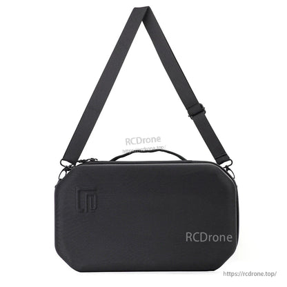 Hard-shell case with adjustable shoulder strap attached, shown ready to carry over the shoulder