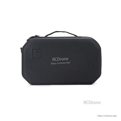 Closed case opposite side view with top handle and embossed logo mark on the left corner