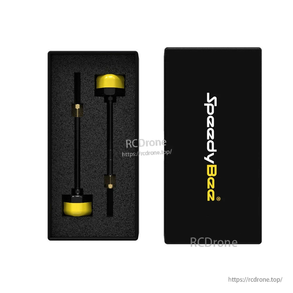 Speedy Bee 5.8 GHz Antenna, SpeedyBee 5.8GHz FPV antenna set with two black antennas and yellow caps in a foam storage box
