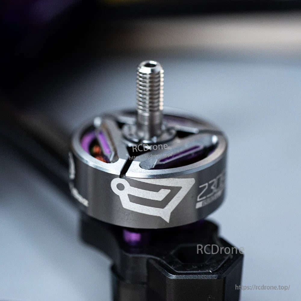 Close-up of SpeedyBee BeeStorm 2306.5 PRO FPV drone motor with threaded shaft and vented gray bell