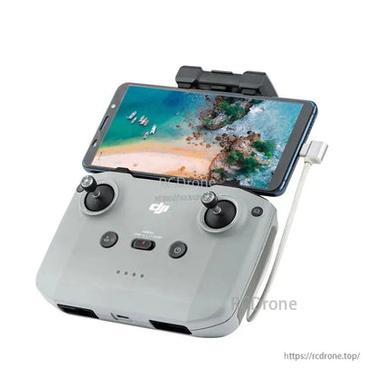StartRC Data Cable, DJI remote control with smartphone mount, dual joysticks, power button, and data cable for seamless drone operation.