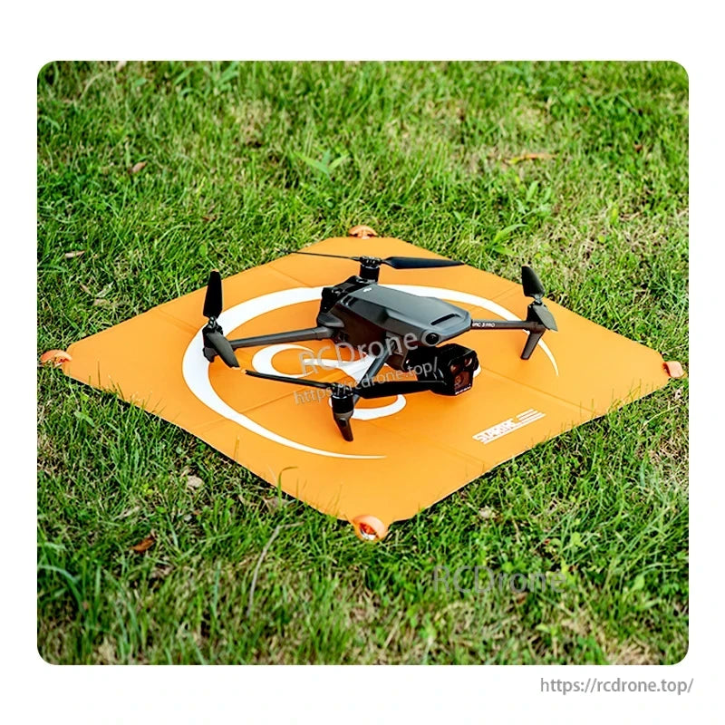StartRC Drone Landing Pad, Double-sided visibility aid with orange on one side and gray on the other for recognition on various surfaces.
