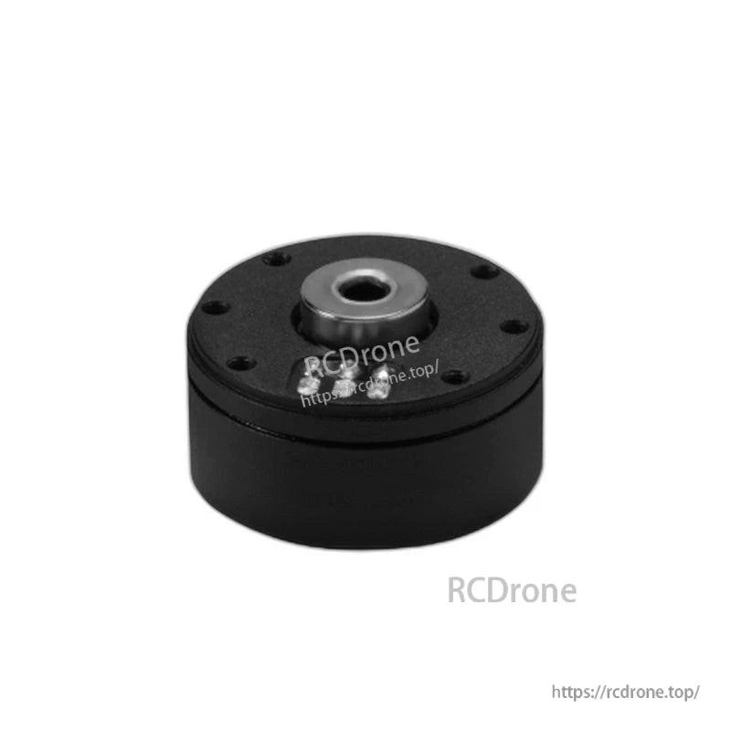 Low-angle close-up of motor front face with center hub and perimeter screw holes