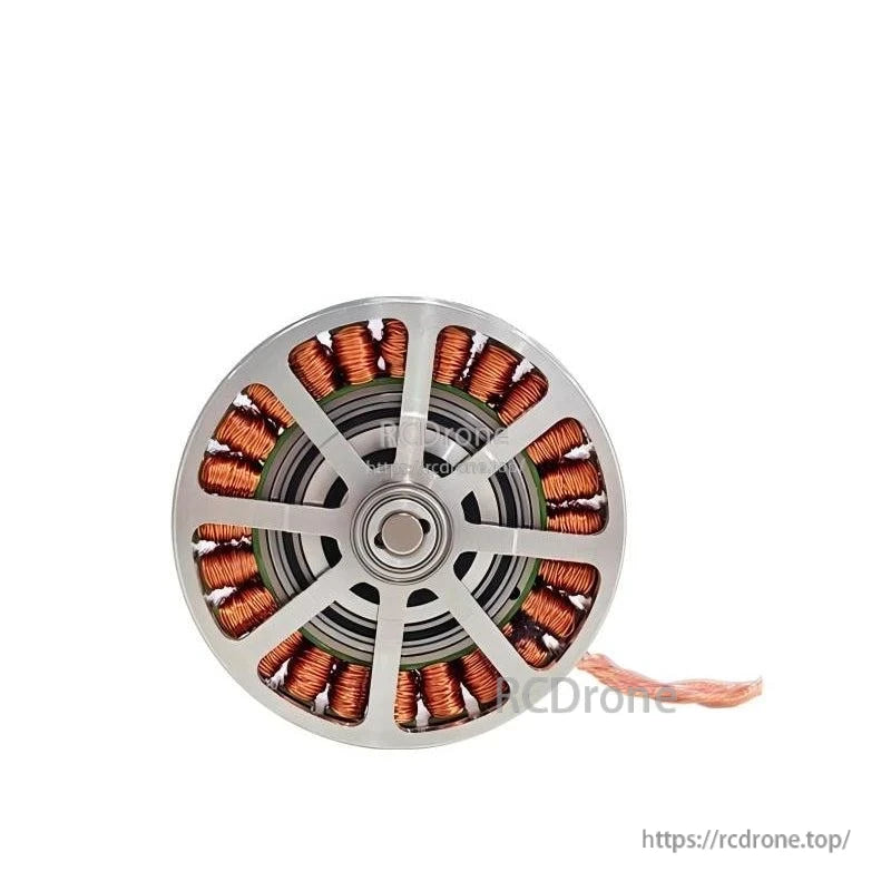 Front view of motor with silver spoke cover over copper windings and center bearing opening