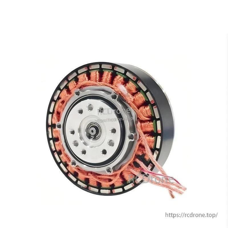 Top view of circular motor housing with copper coil windings and output hub, wires exiting at edge