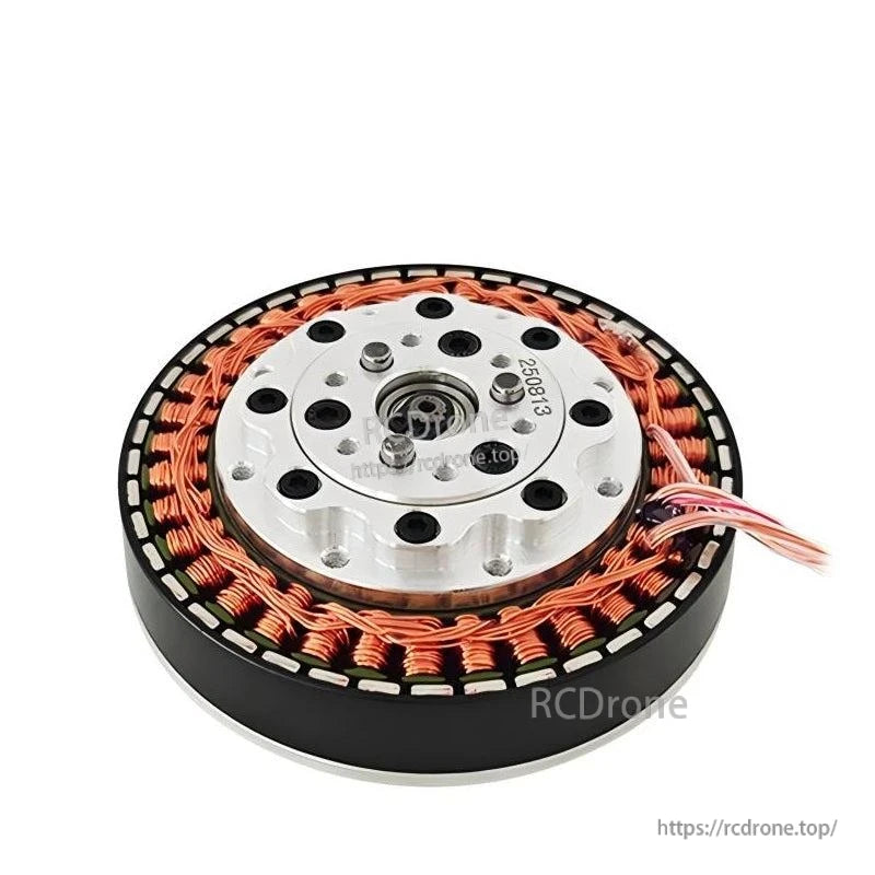 Low-angle view of motor mounting plate with bolt holes, center bore, and wire bundle