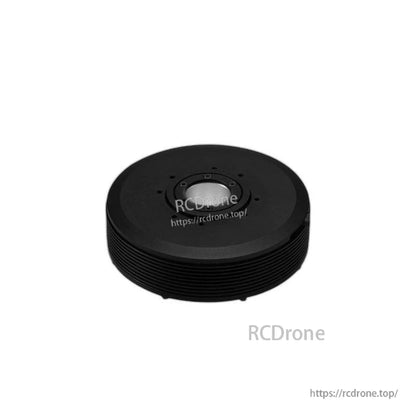 Low angled side profile of motor showing ribbed perimeter and recessed center mounting hub