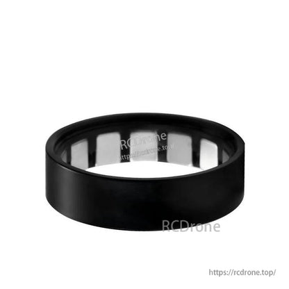 Black ring with reflective inner surface, likely motor component.