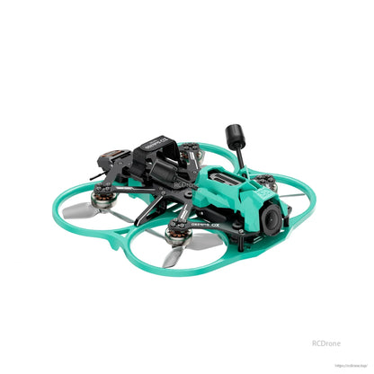 Front-right angle view of 2.5-inch ducted FPV drone showing camera pod, antenna mast, and motor layout