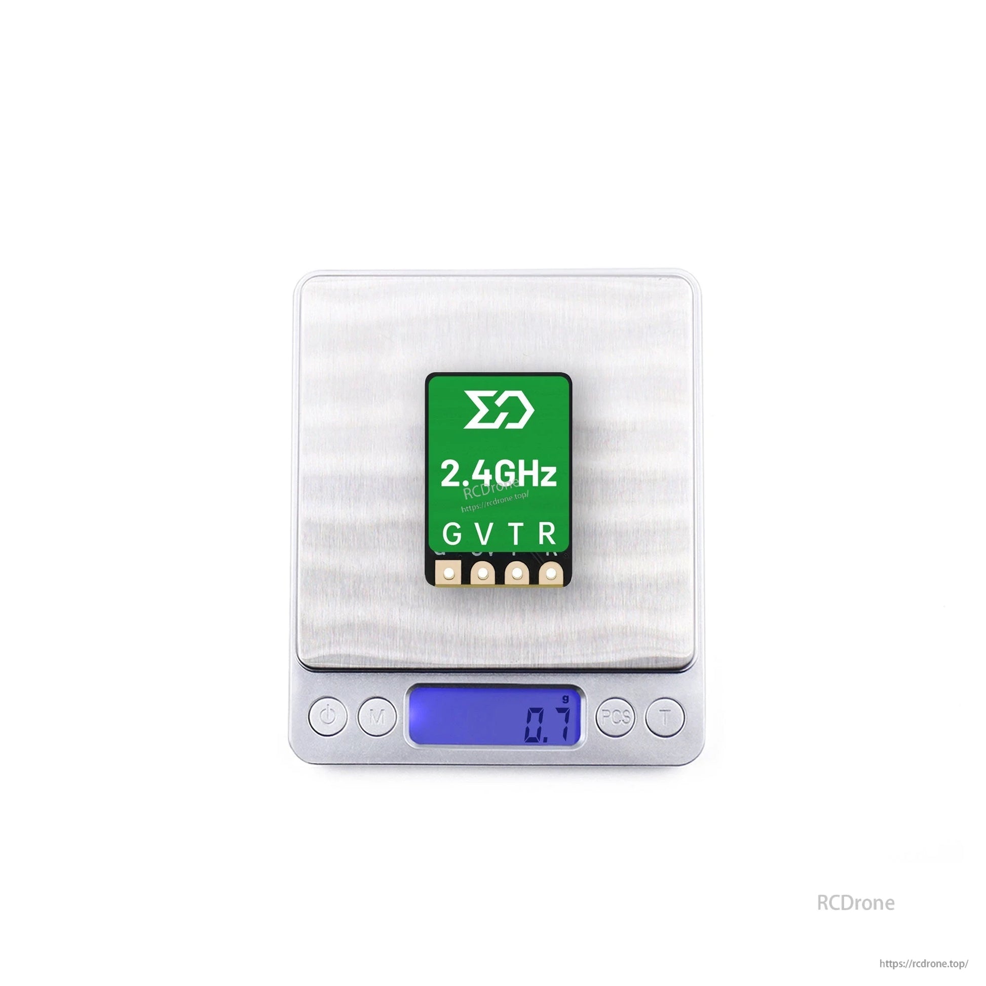 Receiver module on digital scale showing 0.7g weight display
