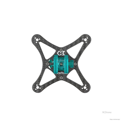 Top view of carbon plate with teal battery holder mount installed at center