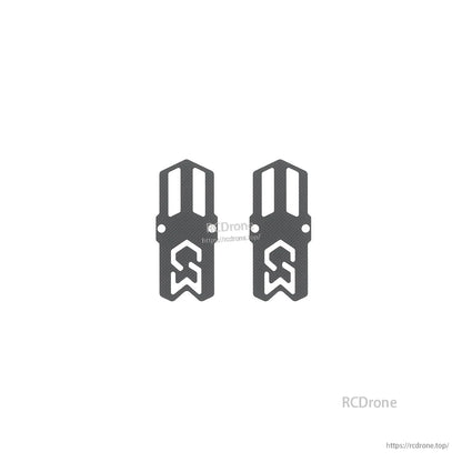 Pair of carbon fiber side plates with logo cutouts and mounting slots