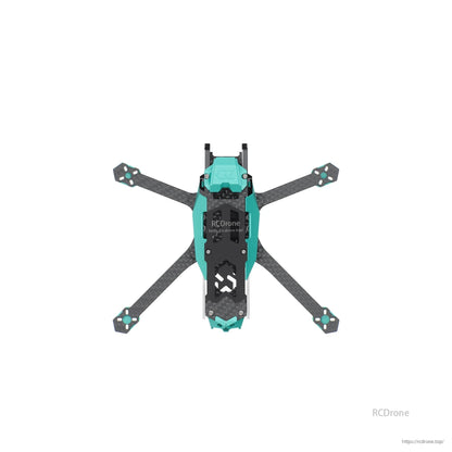 Top-down view of assembled quadcopter frame with four carbon fiber arms and teal body