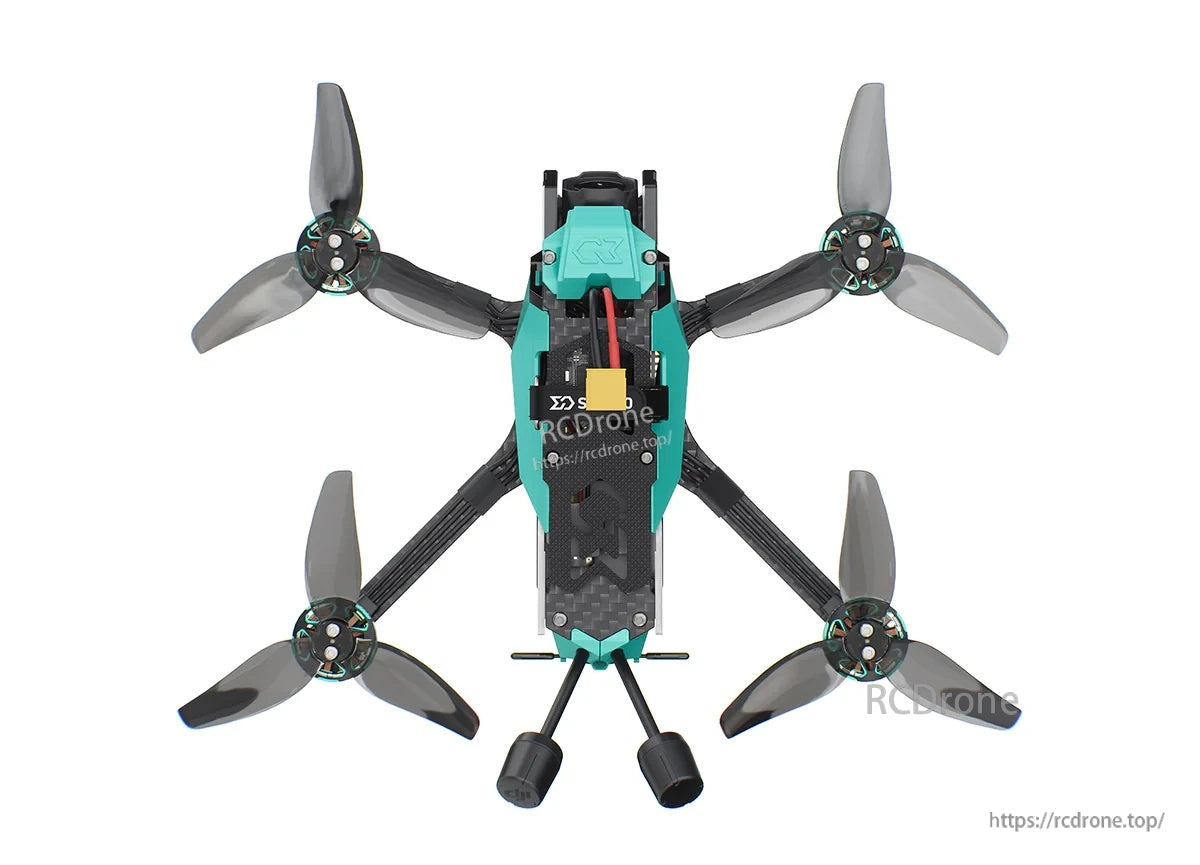 Top view of the quadcopter with four 3-blade props and rear antennas on the OasisFly35 DC frame