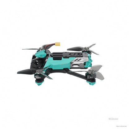 Right side profile showing teal body, arm geometry, and rear antenna mount angle