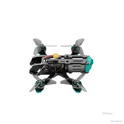 Overhead profile view showing camera cage at front, battery lead on top, and teal rear housing