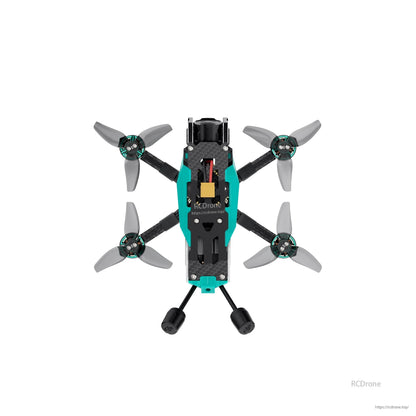 Top-down view of quadcopter showing full frame layout, motors, props, and top-mounted electronics