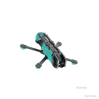 Angled view of the frame showing teal canopy section, top plate cutouts, and motor mount arm ends