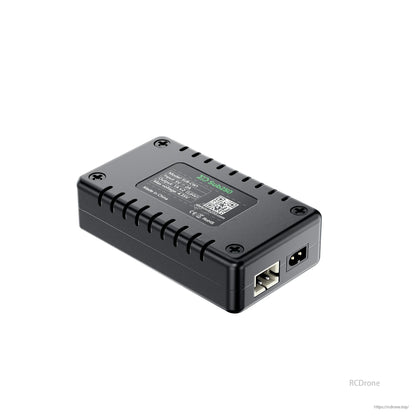 Underside angle view showing label panel and end with USB-A port and DC input jack