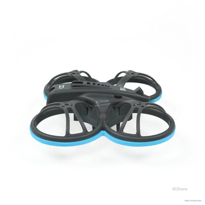 Low side profile of whoop frame with blue bumper rings, showing frame height and ducts