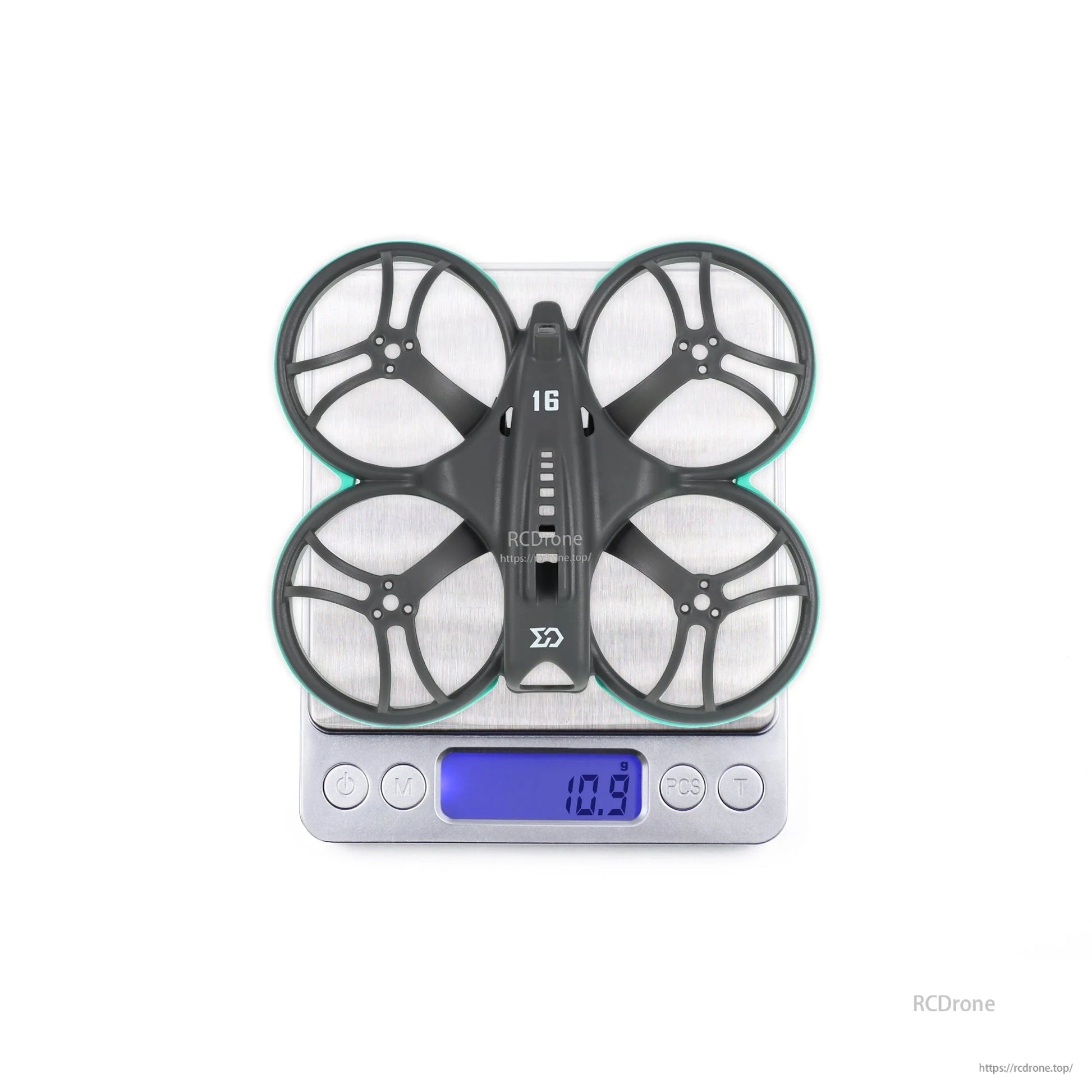 Whoopfly16 frame weight shown on scale display, 10.9g reading